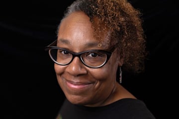 Headshot of alumni author